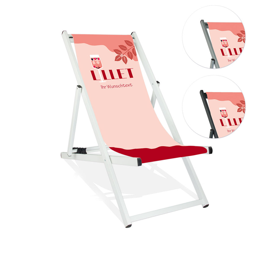 Mittig ist ein weißer Aluminiumliegestuhl abgebildet.
Motiv LILLET, wobei das i ein Aperetif-Glas mit Wildberry darstellt.
Neben dem Liegestuhl sind zwei Kreise abgebildet. In diesen werden die Lasurfarben Silber und Schwarz dargestellt.